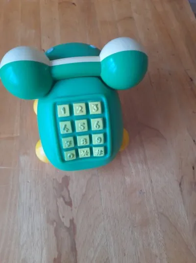 Ancien jouet grenouille roulante hochet téléphone - photo 2