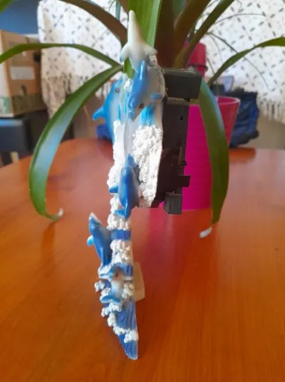 Pendule de table en céramique avec dauphin - photo 2